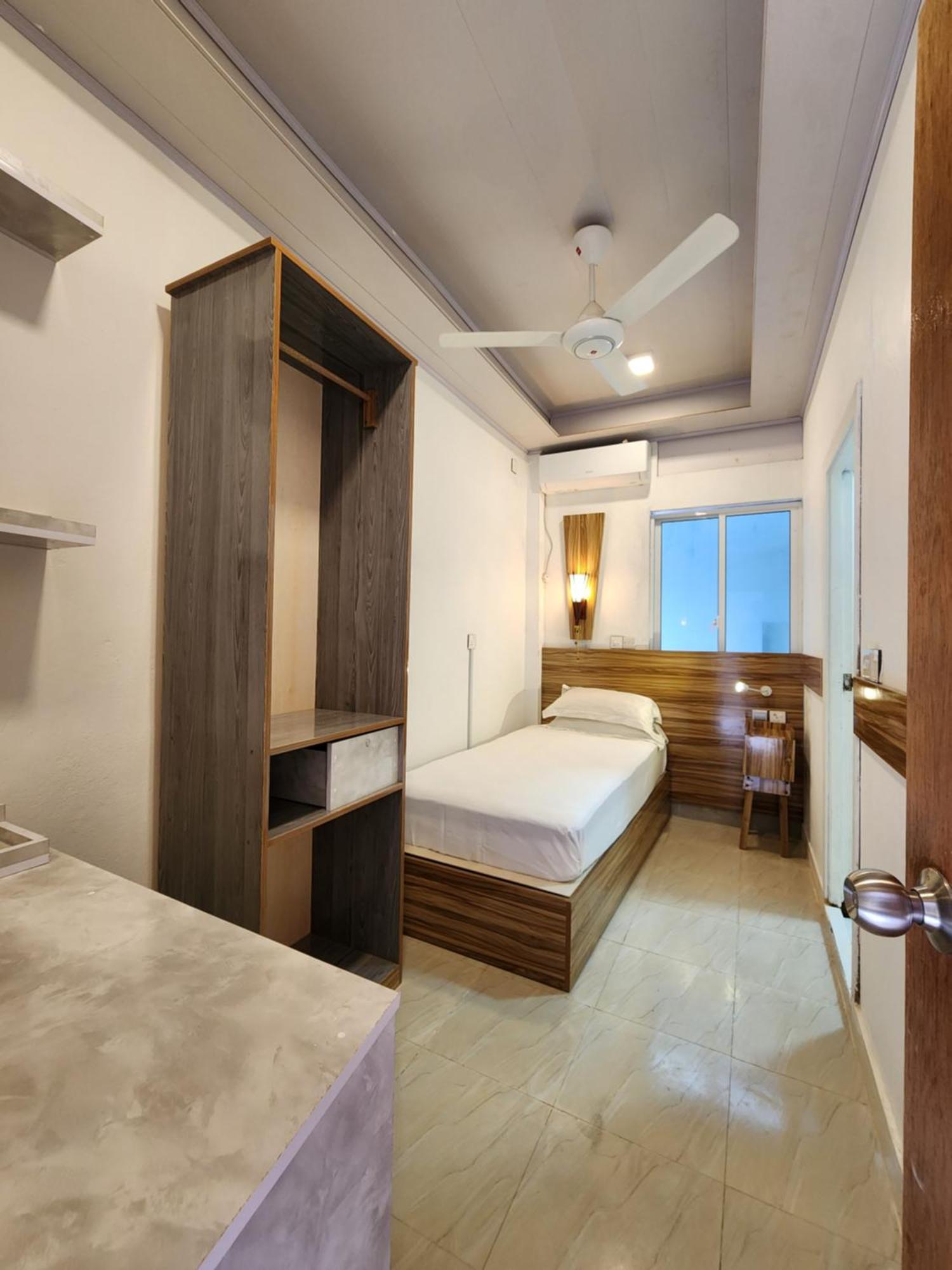 Batuta Maldives Fourson Hotell Thulusdhoo Rum bild